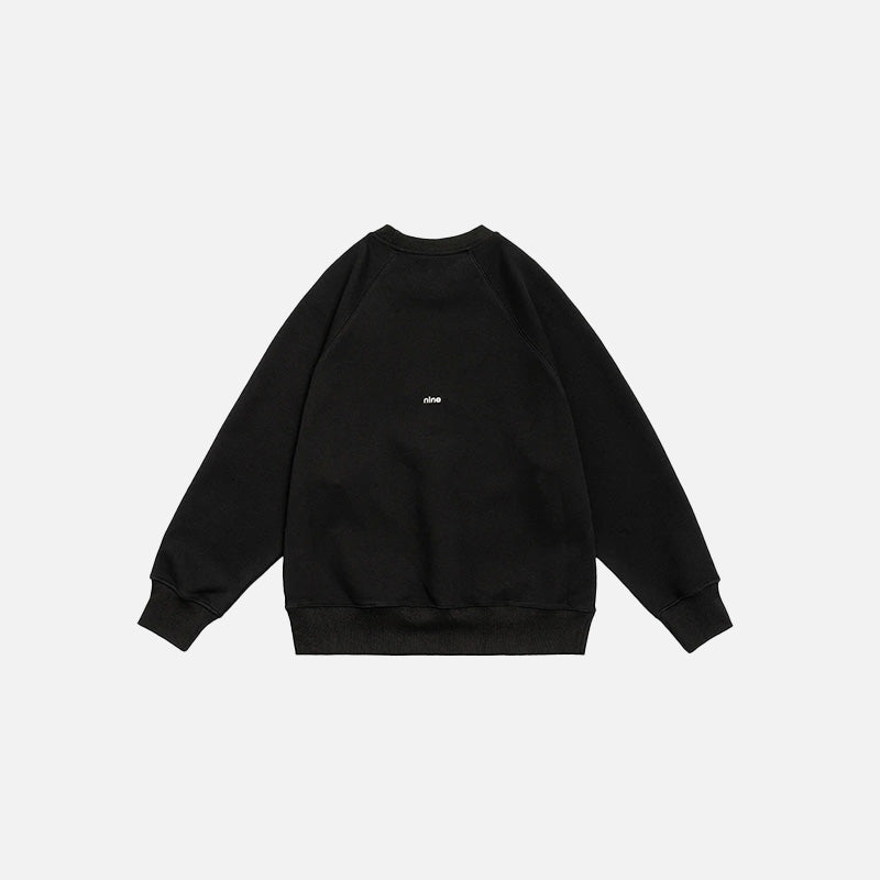 Back view of the black Number 9 Embroidered Sweatshirt in a gray background