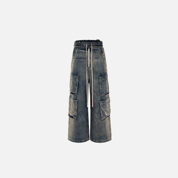 Front view of the blue Adventure Cargo Pants in a gray background