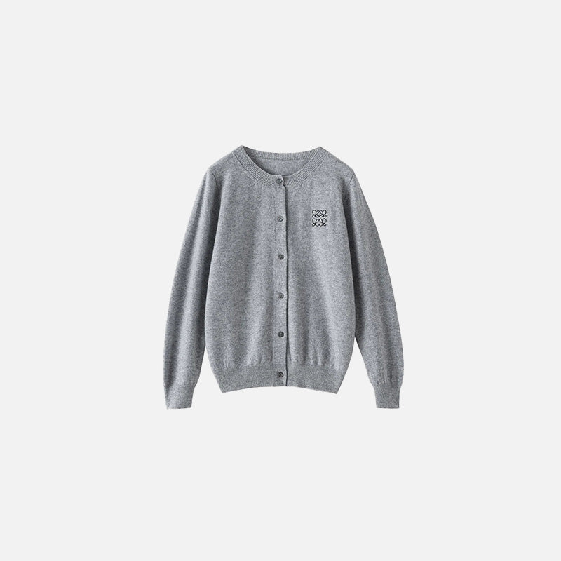 Front view of the light grey Timeless Button-Up Sweater in a gray background