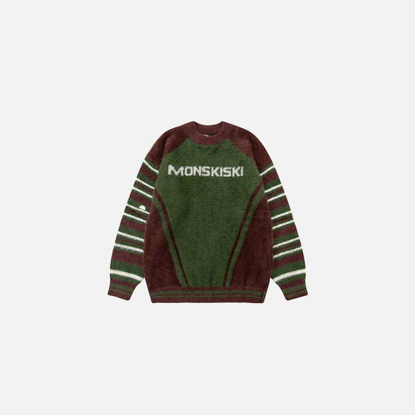 Front view of the green Monskiski Retro Stripe Sweater in a gray background