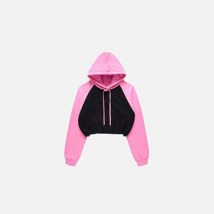 Front view of the pink Women's Brick Color block Crop Hoodie  in a gray background