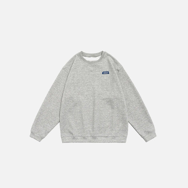 Front view of the grey black Solid Embroidered Sweatshirt in a gray background