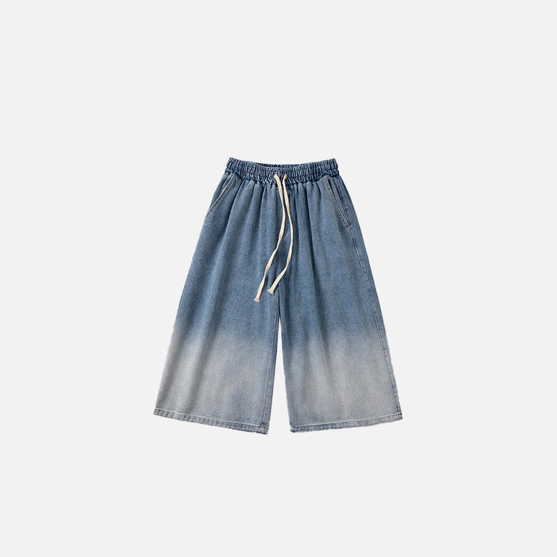 Front view of the blue Relaxed Fit Denim Bermuda Jorts in a gray background