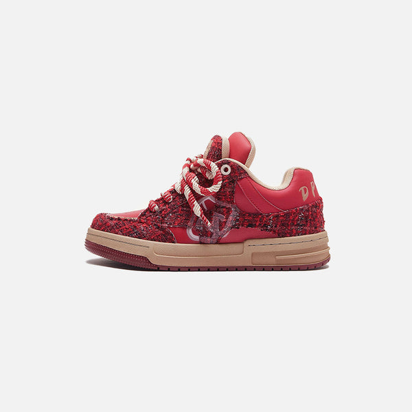 Side View of the red Tweed Street Classic Sneakers in a gray background