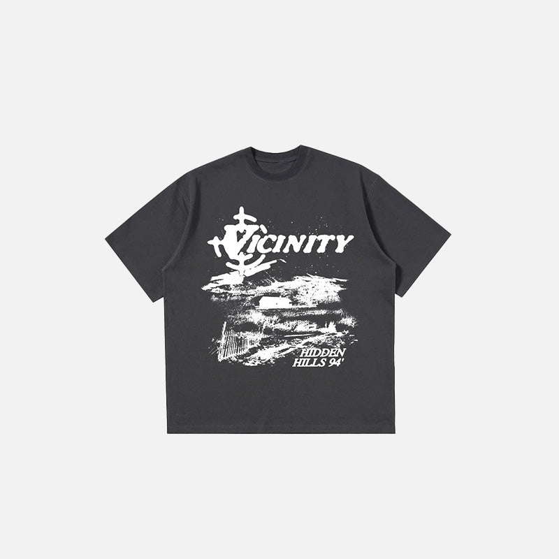 Front view of the dark grey Vicinity Hidden Hills 94 T-shirt in a gray background