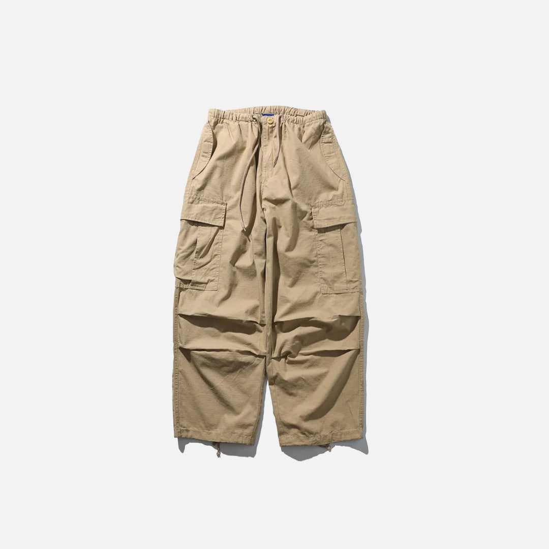 Front view of the khaki Adventure-Ready Cargo Pants in a gray background 