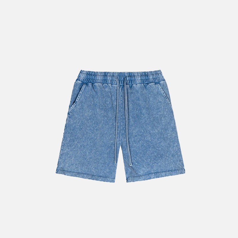 Front view of the blue Vintage Washed Distressed Sport Shorts in a gray background