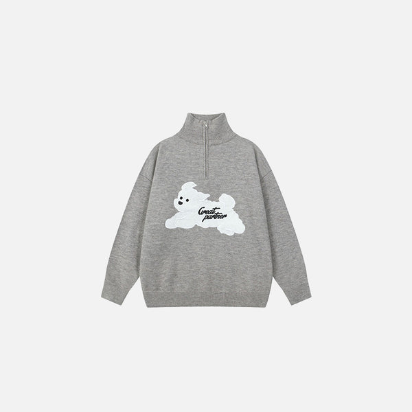 Front view of the grey Puffy Dreams Sweater in a gray background 