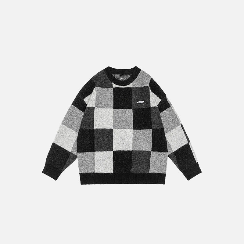 Front view of the black Cozy Patchwork Pullover Sweatshirt in a gray background