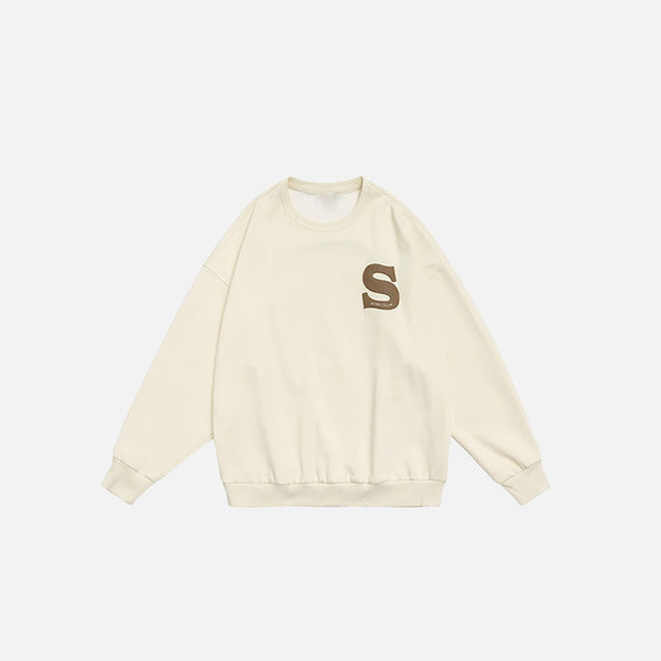 Front view of the beige S Foaming Print Sweatshirt in a gray background