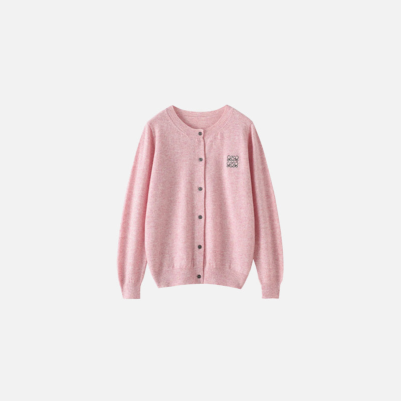 Front view of the pink Timeless Button-Up Sweater in a gray background