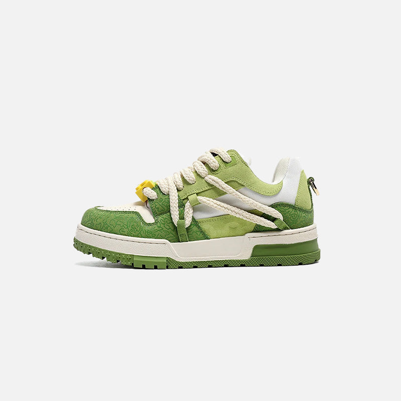 Side view of the green Petal Bloom Sneakers in a gray background