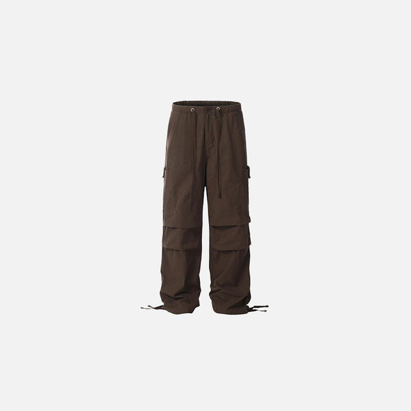 Front view of the coffee Utility Cargo Pants in a gray background