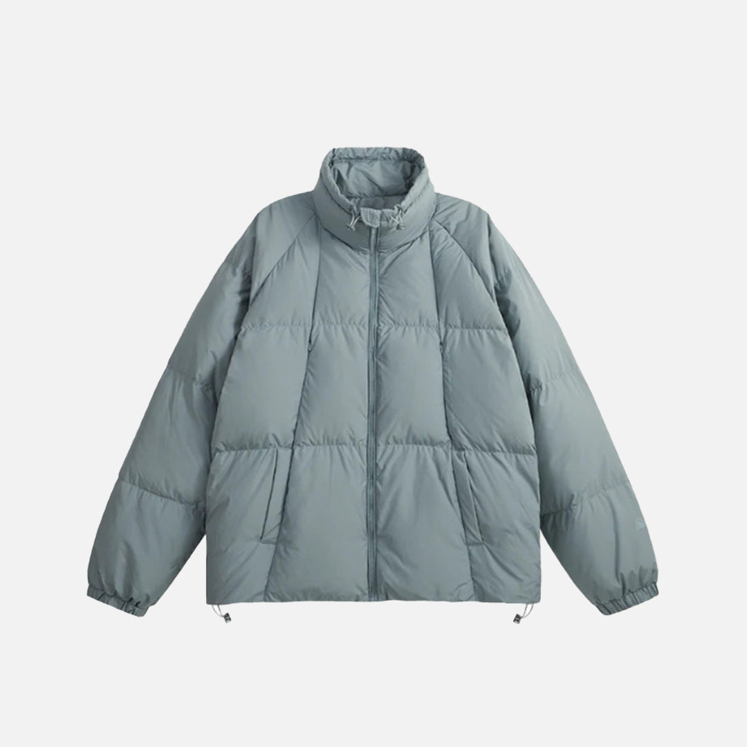 Front view of the blue High-Neck Puffer Jacket in a gray background