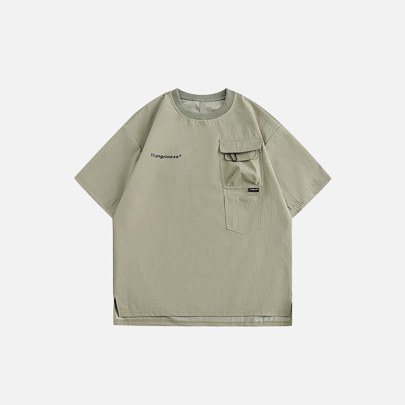 Front view of the green Vintage Loose Pocket T-shirt in a gray background