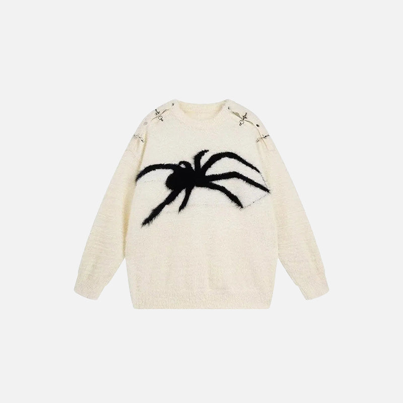 Front view of the beige Spider Chic Sweater in a gray background