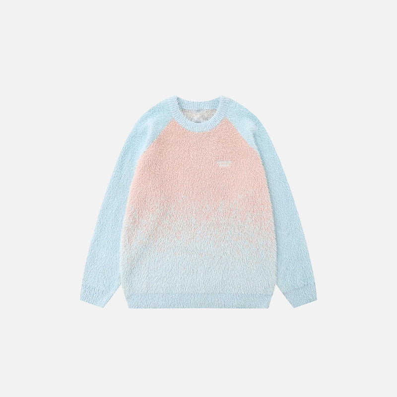 Front view of the blue Gradient Fade Sweater in a gray background