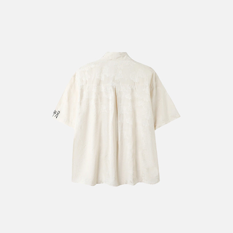 Back view of the beige Women's Floral Embroidered Shirt in a gray background