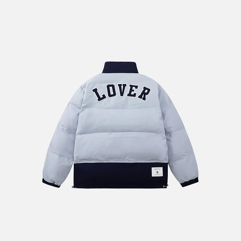 Back view of the blue Iconic Winter Puffer Jacket in a gray background