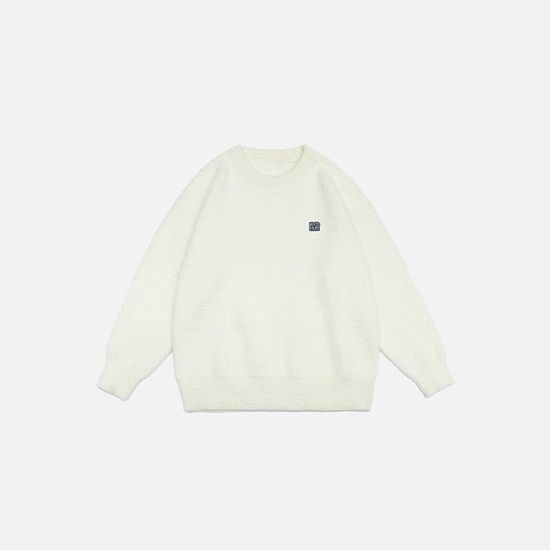 Front view of the beige Classic Cozy Knit Sweatshirt in a gray background