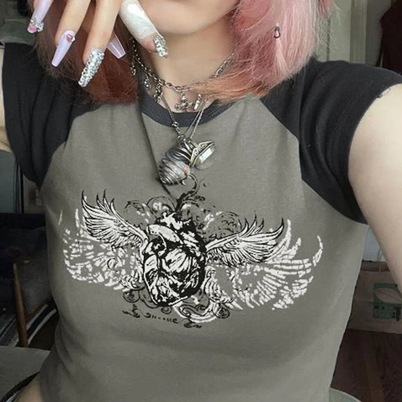 Model wearing the gray Winged Skull Emblem Graphic T-shirt 