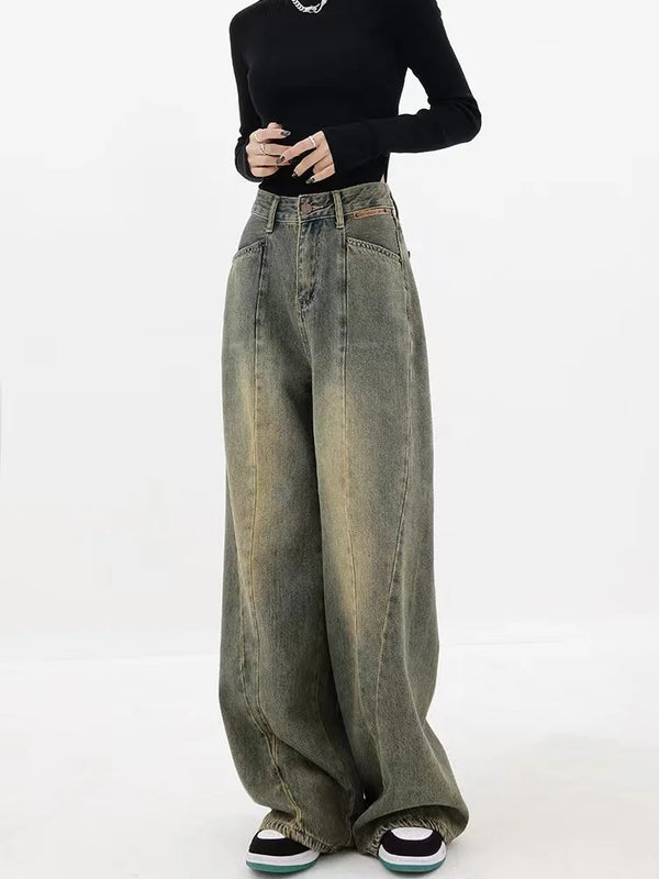 Model wearing the blue Vintage Washed Wide-Leg Crop Jeans 