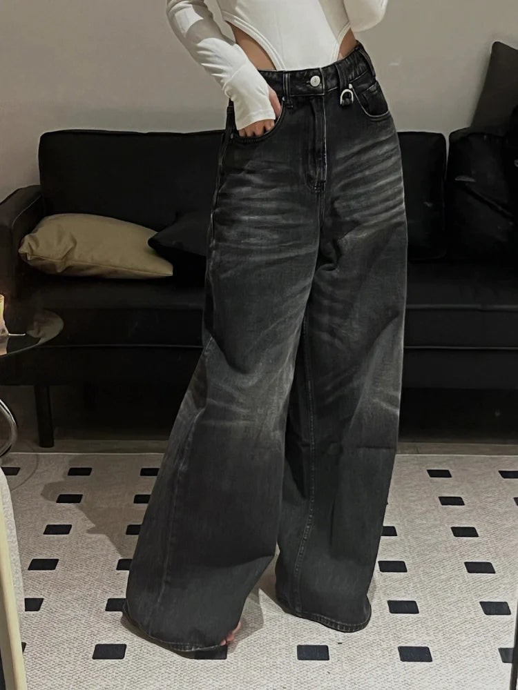 Model wearing the black Distressed Wide-Leg Jeans