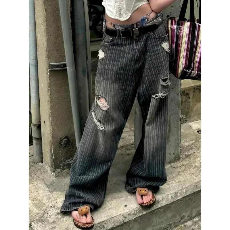 Model wearing the black Distressed Baggy Ripped Jeans