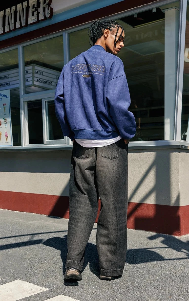 Model wearing the black Retro Wide-Leg Denim Jeans