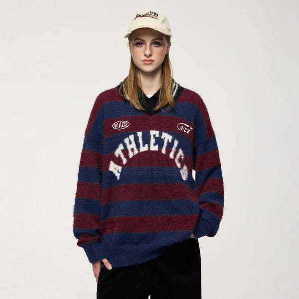 Model wearing the red Striped Athletic Sweater 