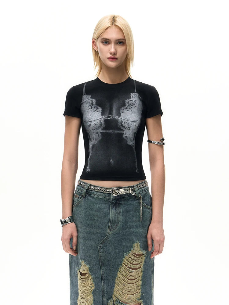 Model wearing the black Y2k Women's Printed T-shirt in a gray background