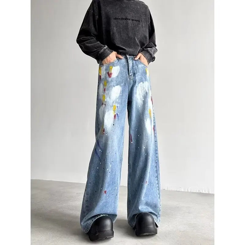 Model wearing the blue Y2K Art Splash Jeans