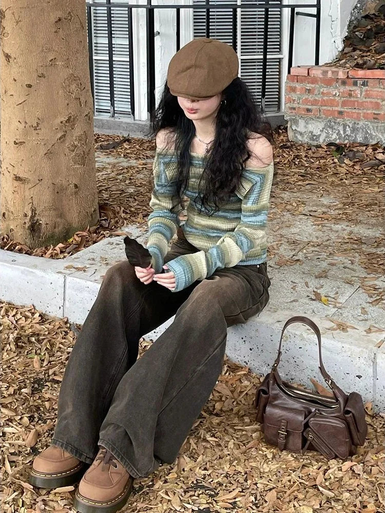 Model wearing the green Off-Shoulder Striped Knit Sweater