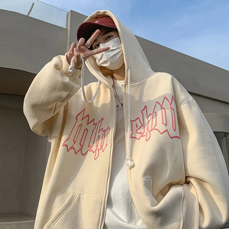 Model wearing the apricot Gothic Arch Hoodie