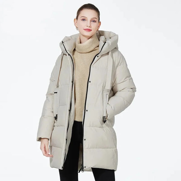 Model wearing the white Women's Padded Puffer Jacket in a gray background