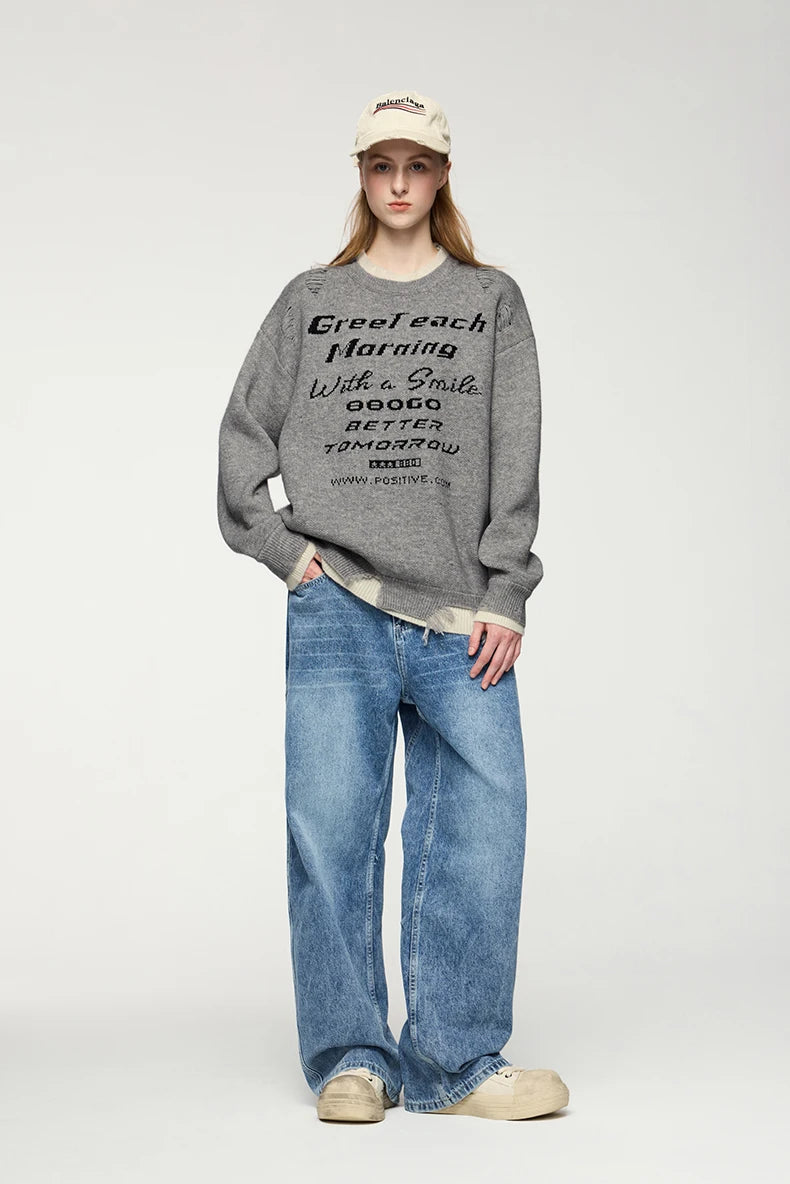 Model wearing the gray Positive Morning Text Sweater 