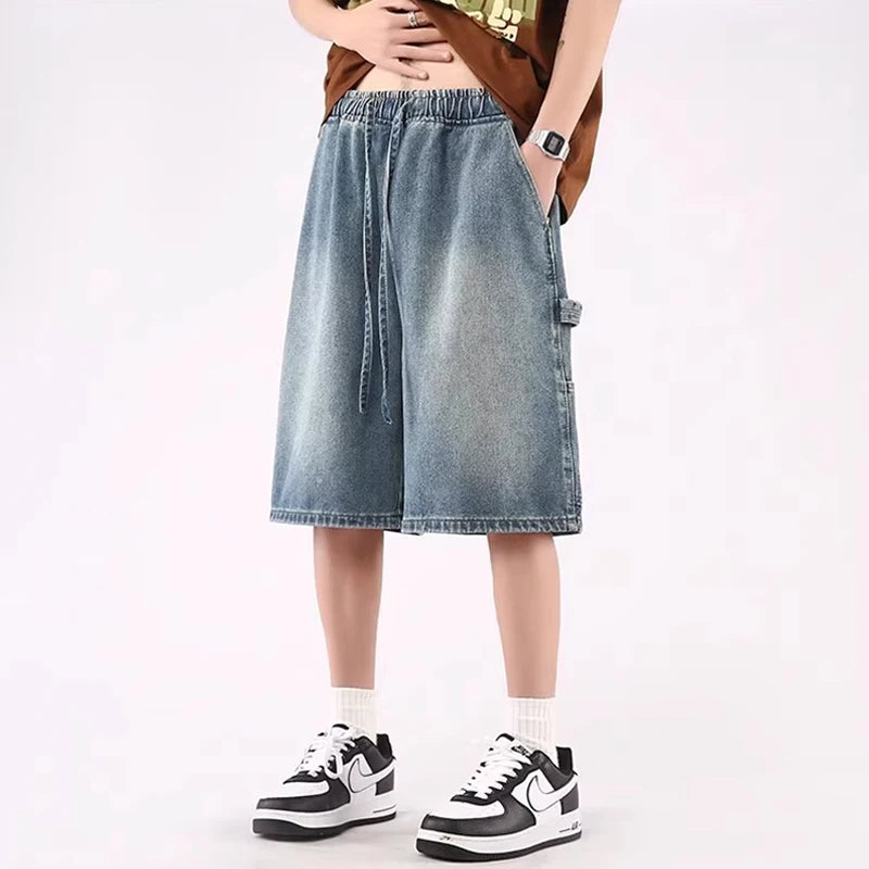 A model wearing the blue Baggy High Blue Denim Jorts from DAXUEN