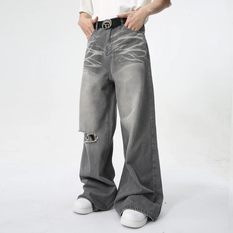 Model wearing the gray Vintage Distressed Baggy Jeans