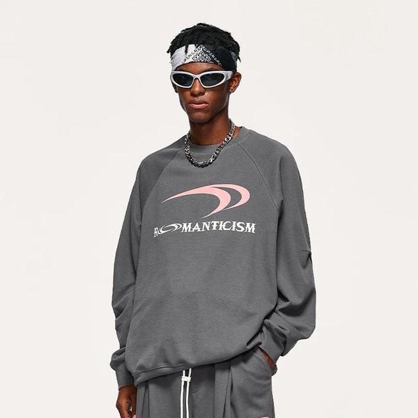 Model wearing the grey Modern Romanticism Sweatshirt in a gray background