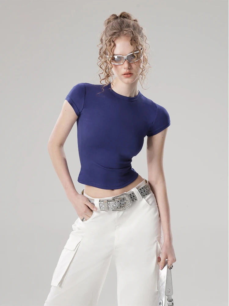 Model wearing the blue Women's Basic Solid Color T-shirt