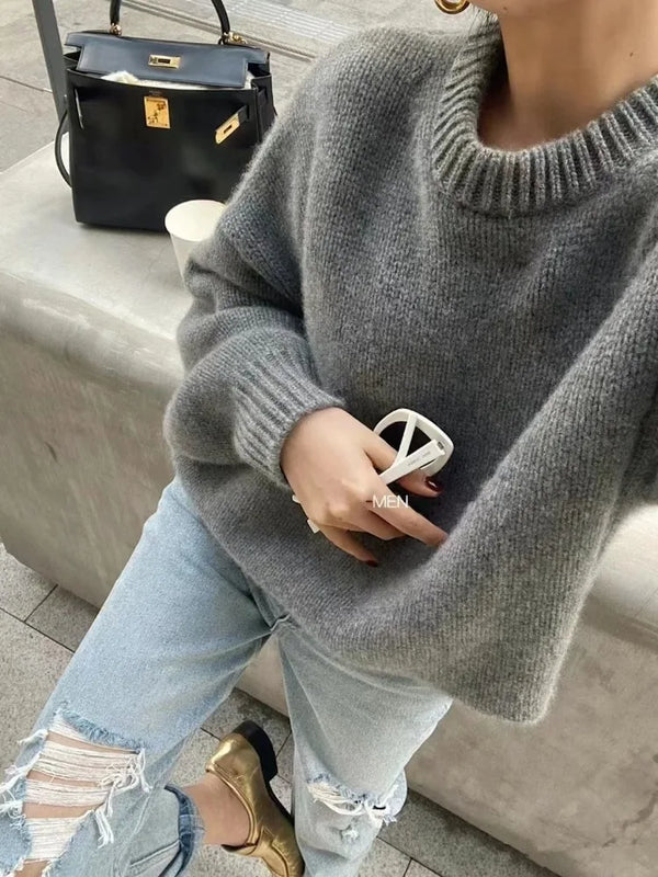 Model wearing the gray Cozy Loose-Fit Sweater