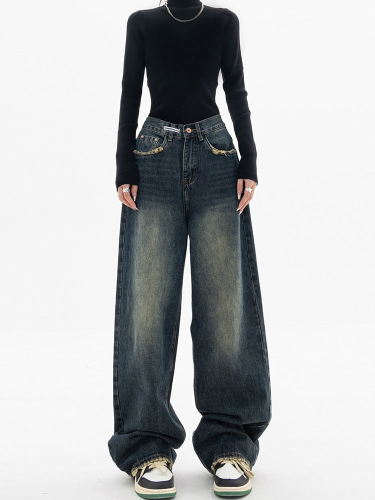 a standing model wearing the Vintage High Waist Women's Jeans