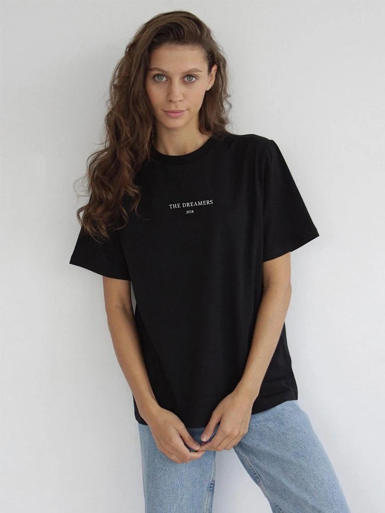 Model wearing the black Women's Loose Printed T-shirt