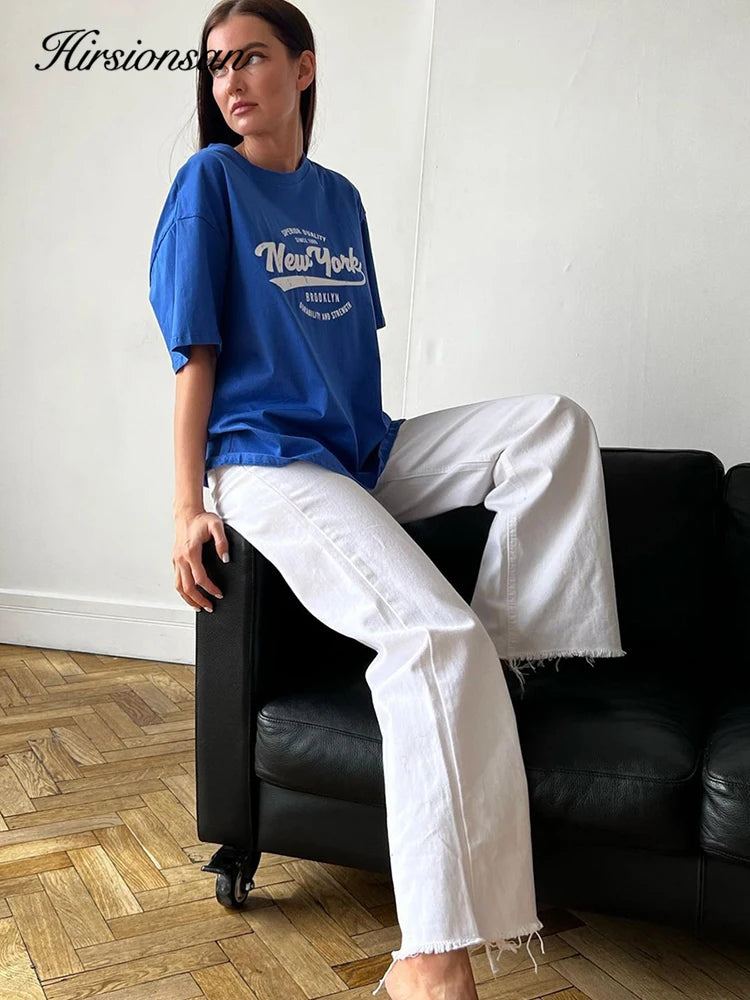 Model wearing the blue Vibrant New York Graphic T-shirt 