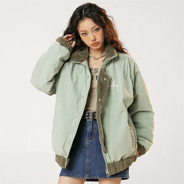 Model wearing the green Chic Fleece-Lined Jacket in a gray background