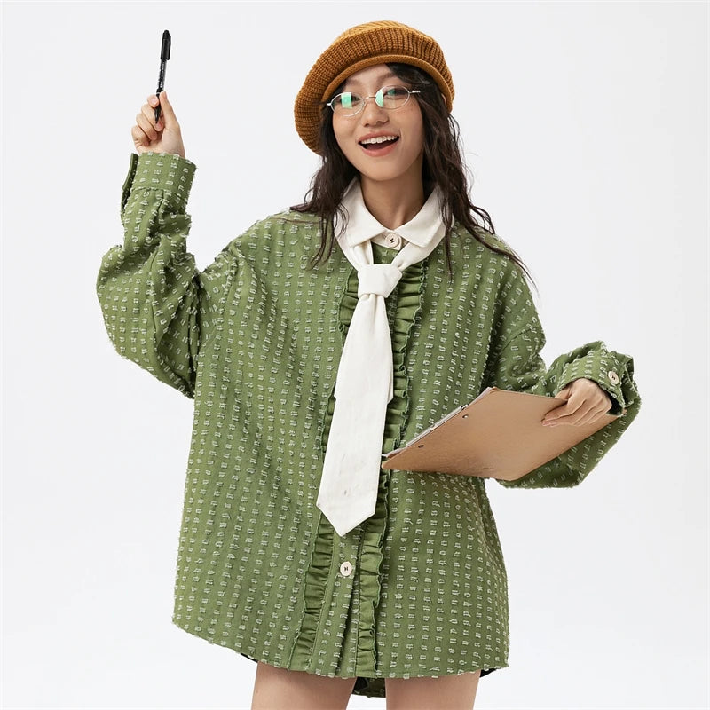 A girl holding a pen while wearing the Women's Spring Hippie Shirt from DAXUEN.