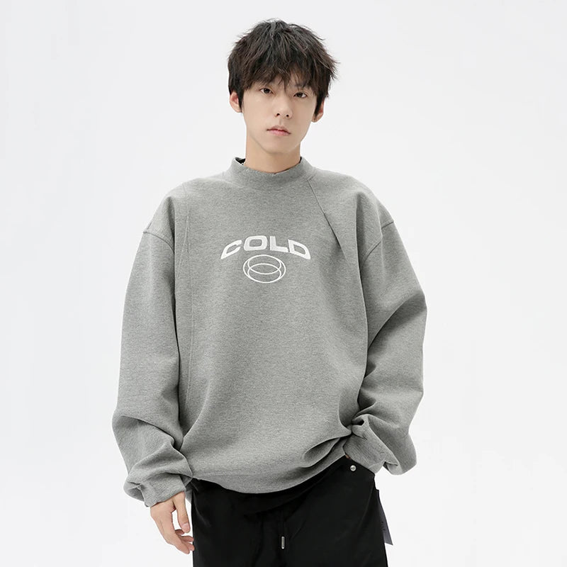 Model wearing the gray Cold Graphic Sweatshirt