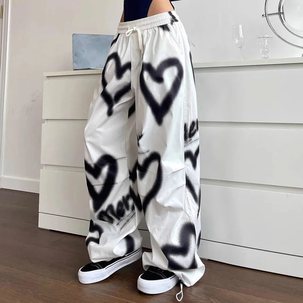 Model wearing the white Graffiti Heart Lounge Pants