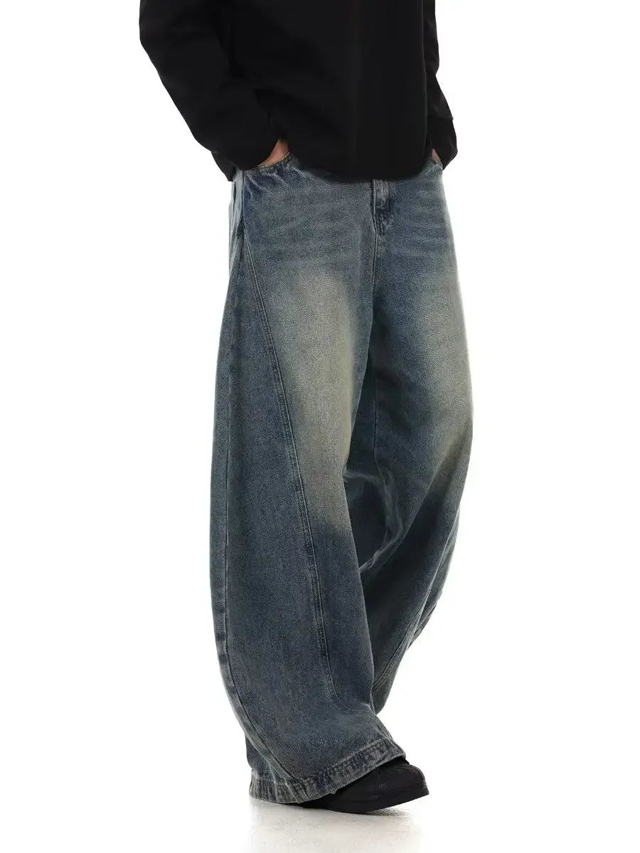 Model wearing the blue Y2K Gravity Denim Jeans