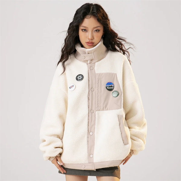 Model wearing the white Arctic Breeze Puffer Jacket in a gray background